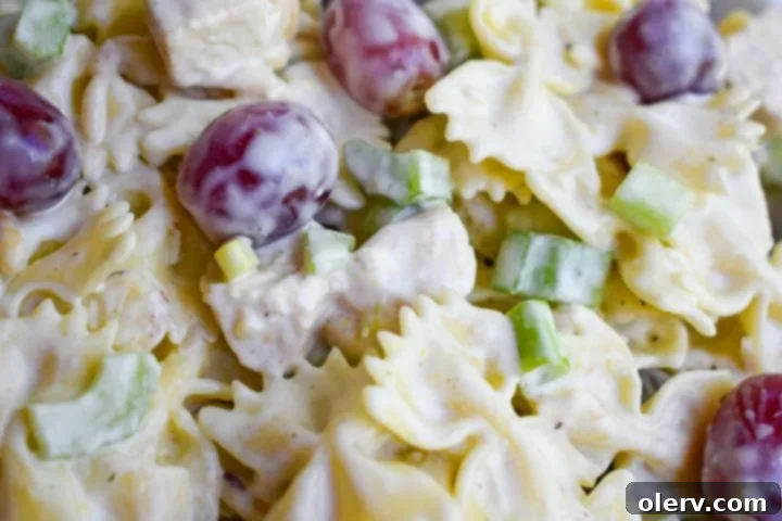 Bright Lemon Tarragon Pasta Medley 5 Fresh tarragon sprigs and sliced lemons, key ingredients for the vibrant pasta salad dressing.