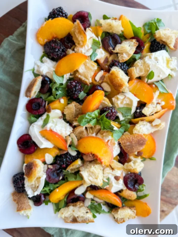 Sun-Kissed Peach & Burrata Delight 2 A vibrant summer peach salad with creamy burrata, fresh peaches, cherries, and basil, drizzled with dressing, served in a rustic bowl.