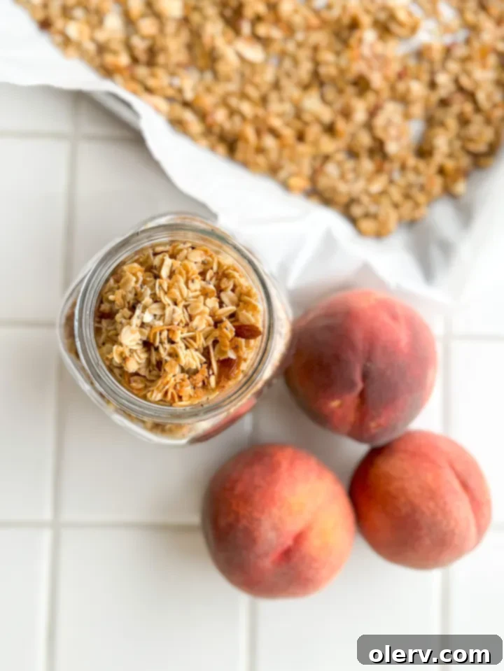 Whip Up Your Own Granola 6 A bowl of homemade granola with milk and berries, showcasing a healthy breakfast.