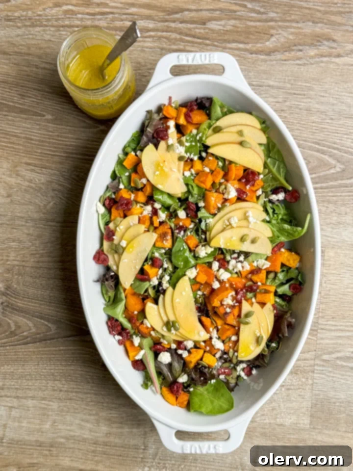 Crisp Apple Harvest Salad 6 Serving a vibrant Apple Harvest Salad with dressing on the side
