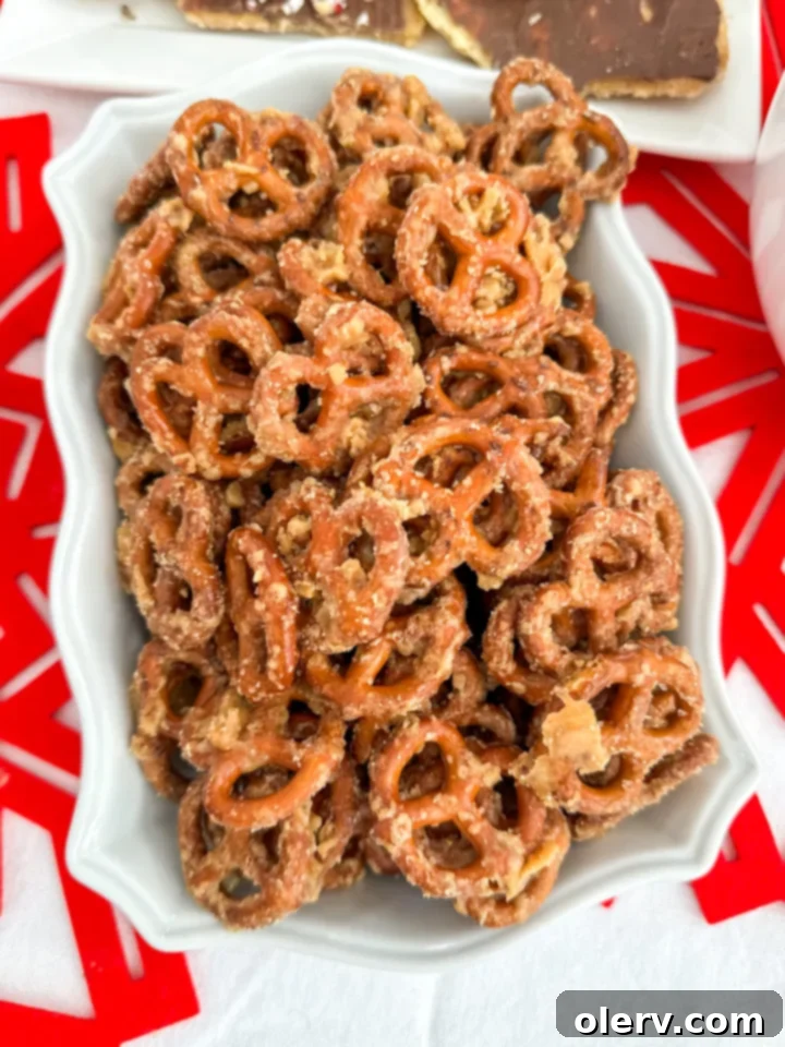 Sweet and Salty Toffee Pretzel Crunch 4 A bowl of delicious Butter Toffee Pretzels with scattered toffee bits