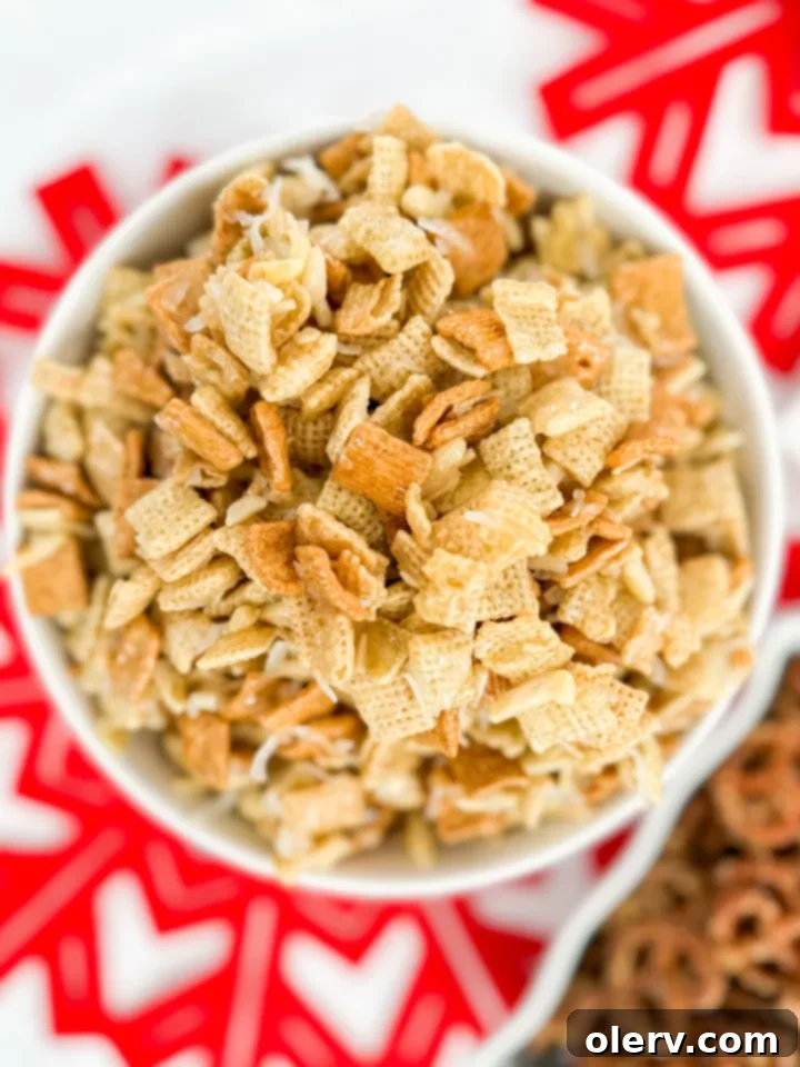 The Ultimate Christmas Crack Recipe Collection 6 Bowl of sweet Chex Mix known as The Good Stuff