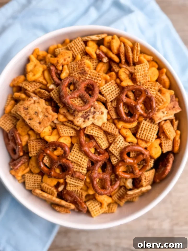 A large bowl of Ranch Chex Mix set on a table, perfect for a Super Bowl party or game day gathering.