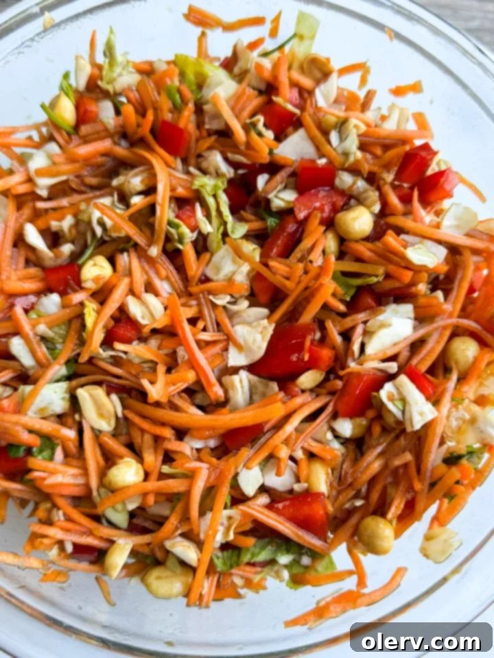Individual ingredients for the sweet soy dressing, including soy sauce, ginger, garlic, lime, and sesame oil, laid out for preparation.