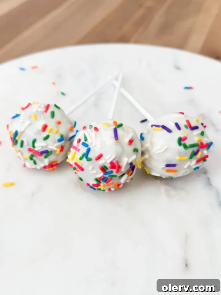 A freshly baked cake in a pan, ready to be transformed into cake pop dough using a stand mixer.
