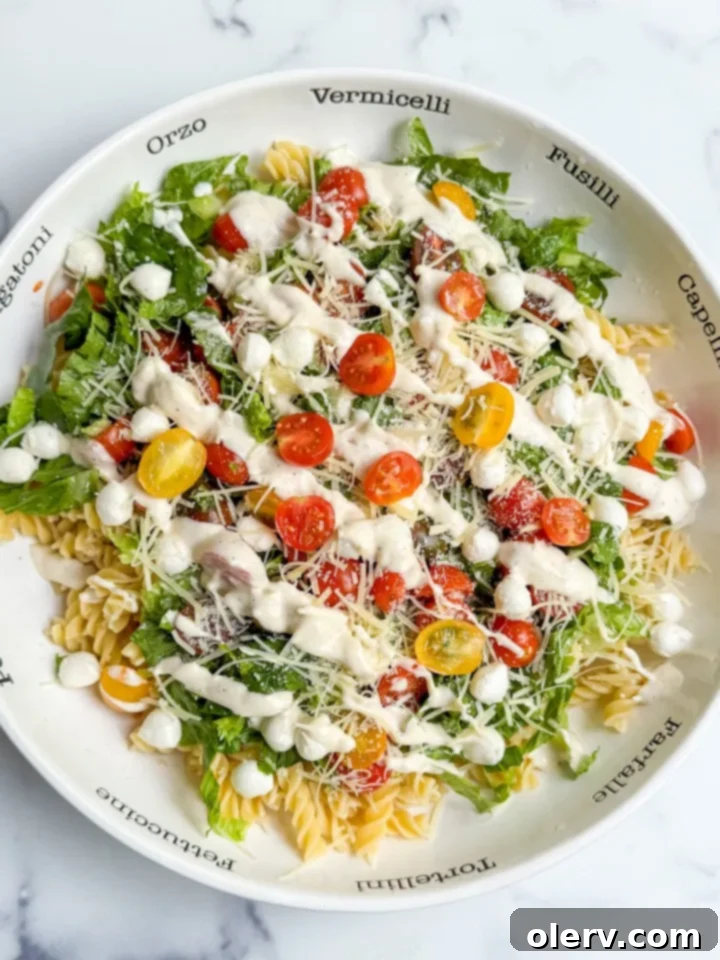 Creamy Caesar Pasta Delight 2 Caesar Pasta Salad with fresh ingredients and dressing