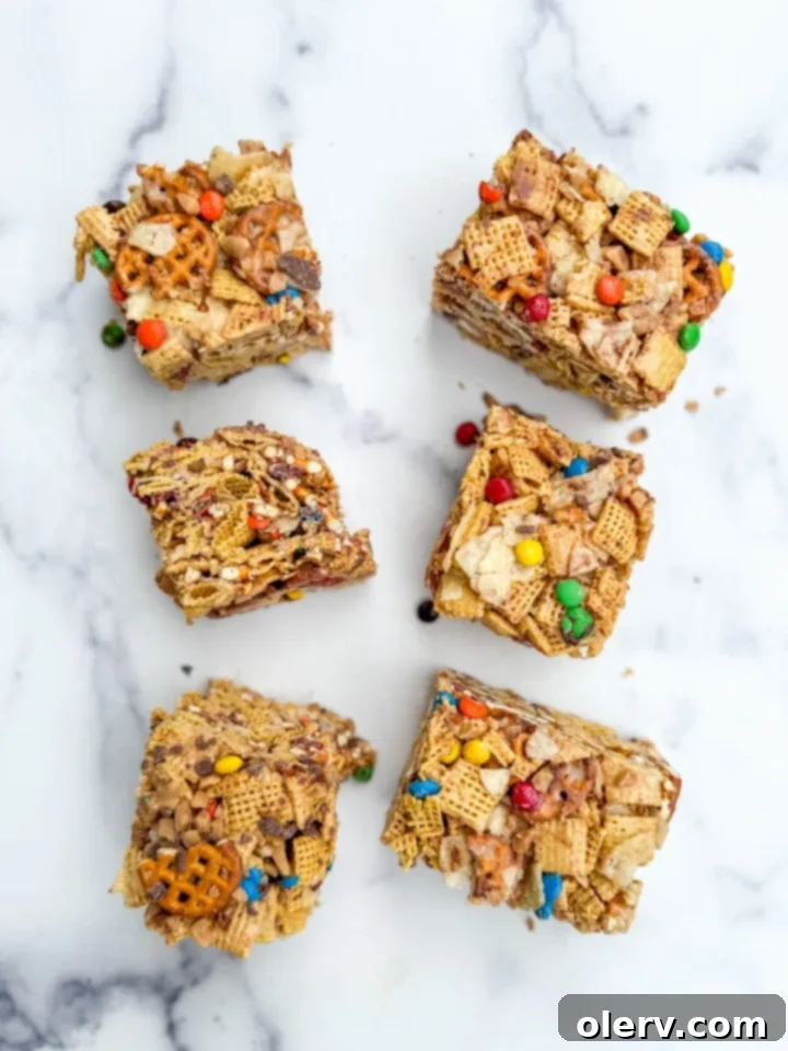 Hodgepodge Cereal Bars 3 Close-up of Kitchen Sink Cereal Bars, showing the various inclusions like M&Ms and toffee bits.