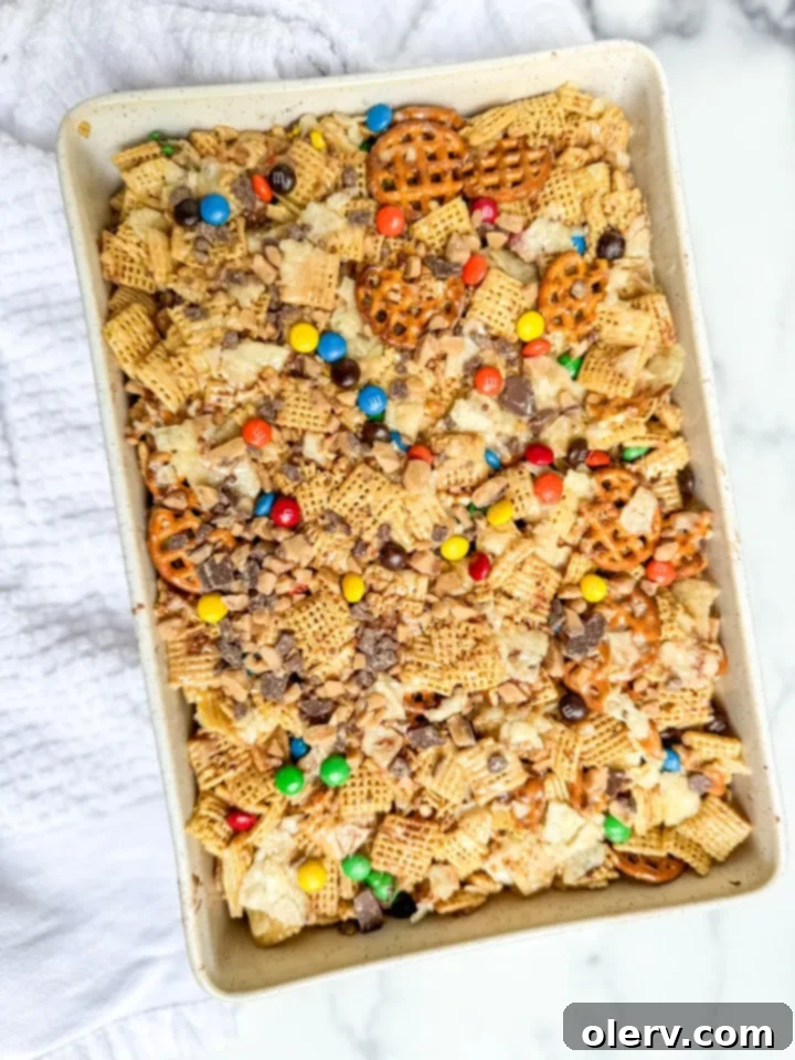 Hodgepodge Cereal Bars 5 Process shot of mixing ingredients for Kitchen Sink Cereal Bars.
