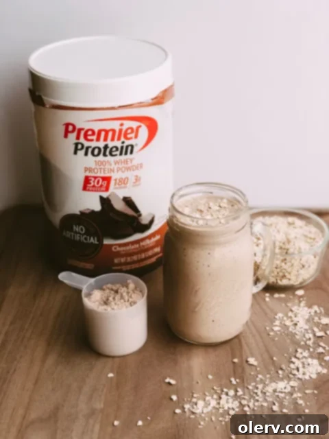 Oatmeal Cookie Delight Protein Shake 2 Delicious Oatmeal Cookie Protein Shake in a glass with oats and cinnamon