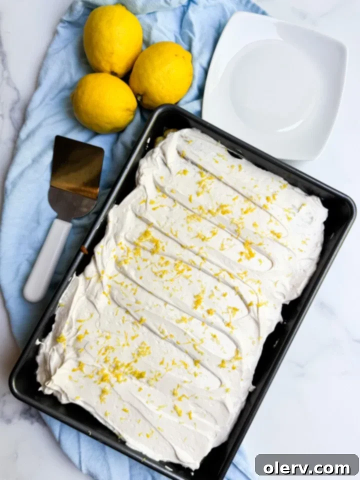 Lemon Dream Bliss 3 Lemon Dream Cake slice showing moist lemon poppyseed cake and fluffy lemon frosting