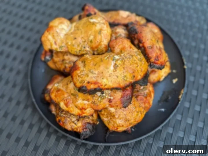 Zesty Greek Grilled Chicken Made Easy 3 Close-up of fresh ingredients for Greek chicken marinade, including Greek yogurt, lemon, and fresh herbs