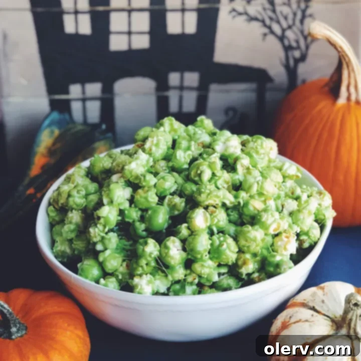 Popcorn Slime Delight 2 Vibrantly green Ooey Gooey Slime Popcorn, a perfect sticky and sweet Halloween treat.
