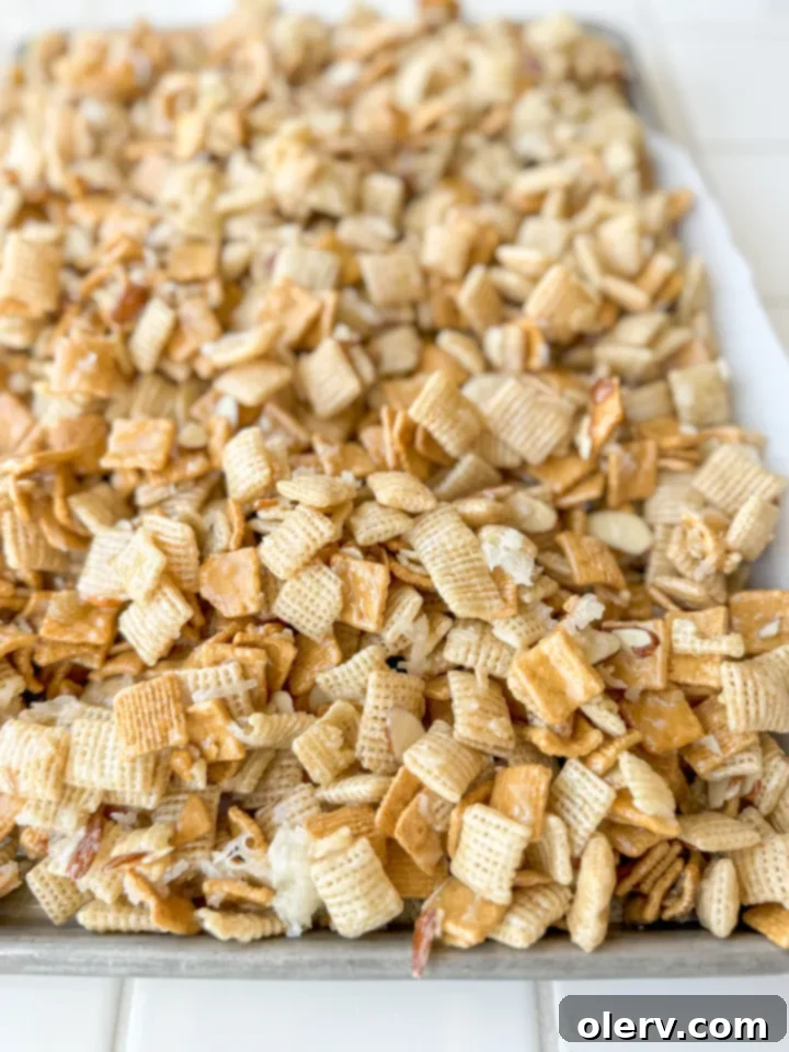 Gems 2 Close-up of a bowl filled with 'The Good Stuff' sweet Chex mix, showing the crunchy cereals, coconut, and almonds.