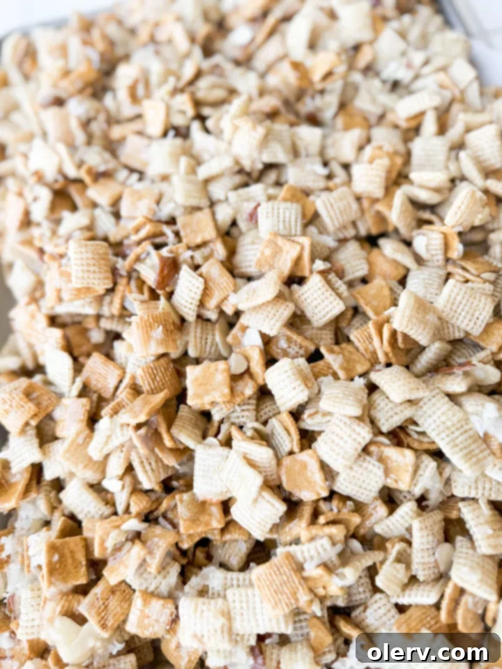 Gems 5 Ingredients for 'The Good Stuff' sweet Chex mix laid out: Rice Chex, Golden Grahams, coconut, slivered almonds, butter, sugar, and corn syrup.