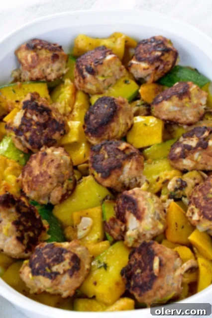 Harvest Time Meatballs recipe card image Harvest Time Meatballs with fresh zucchini and squash served in a pan