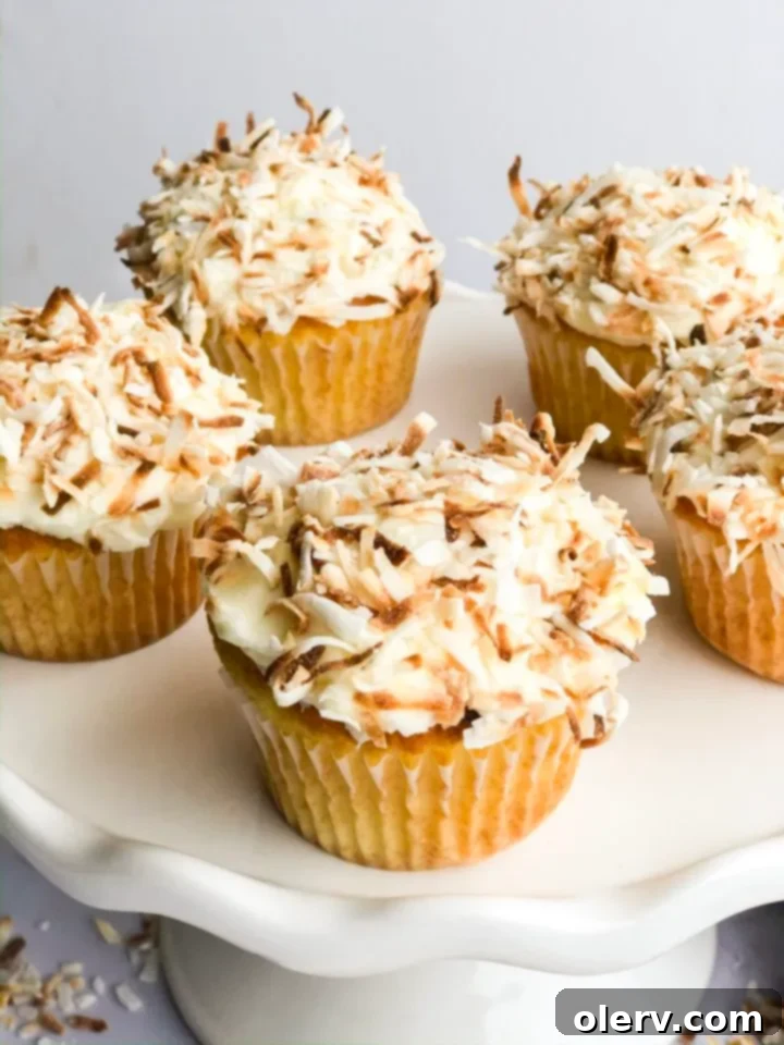 Triple Coconut Dream Cupcakes 3 Close-up of a perfectly frosted coconut cupcake