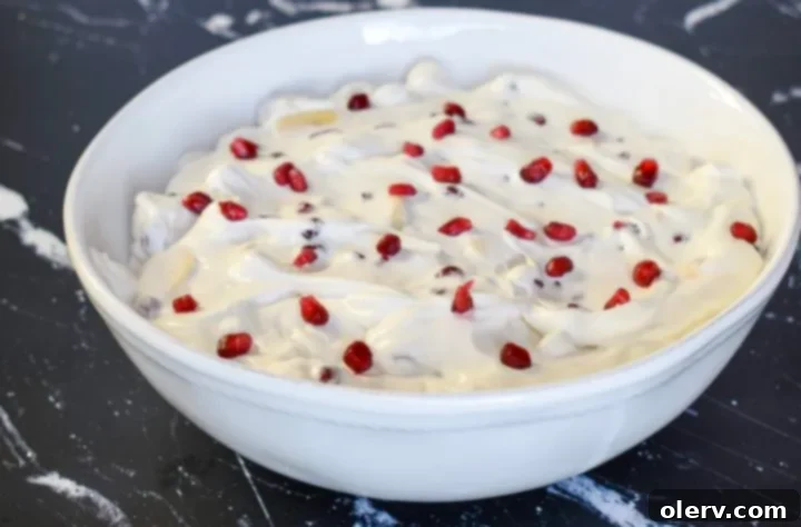 Pomegranate Banana Delight 2 Vibrant Pomegranate Banana Fruit Salad with Homemade Whipping Cream