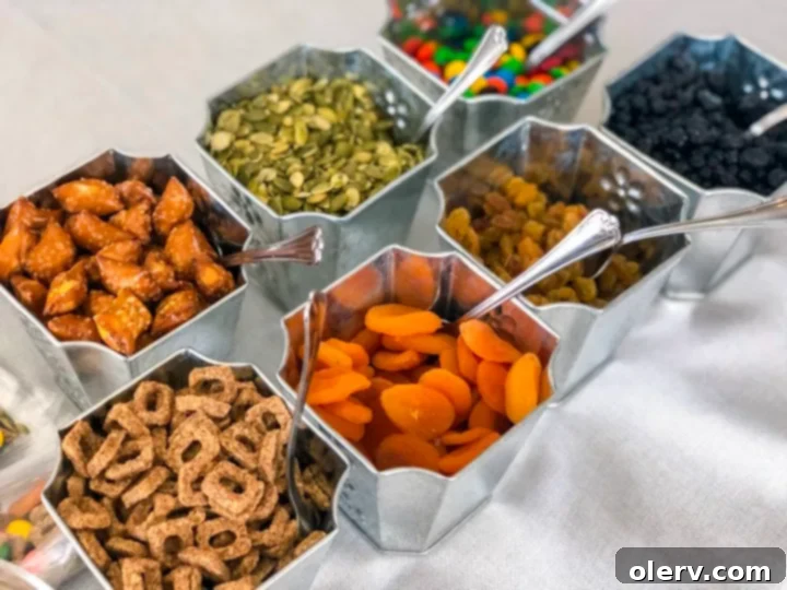 Craft Your Own Trail Mix 2 Assortment of DIY trail mix ingredients laid out for selection