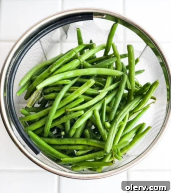 Quick Instant Pot Garlic Green Beans 2 Vibrant green beans coated in rich garlic butter, ready to be served