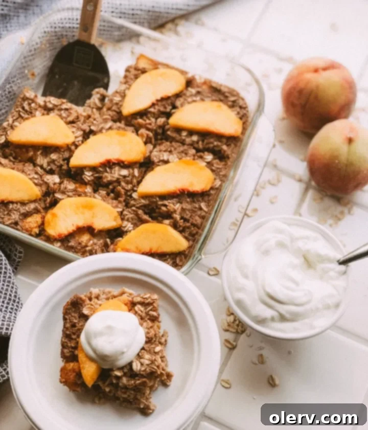 Sweet Peach Baked Oatmeal 6 Assortment of ingredients for baked oatmeal, including oats, peaches, milk, and cinnamon, laid out on a wooden surface
