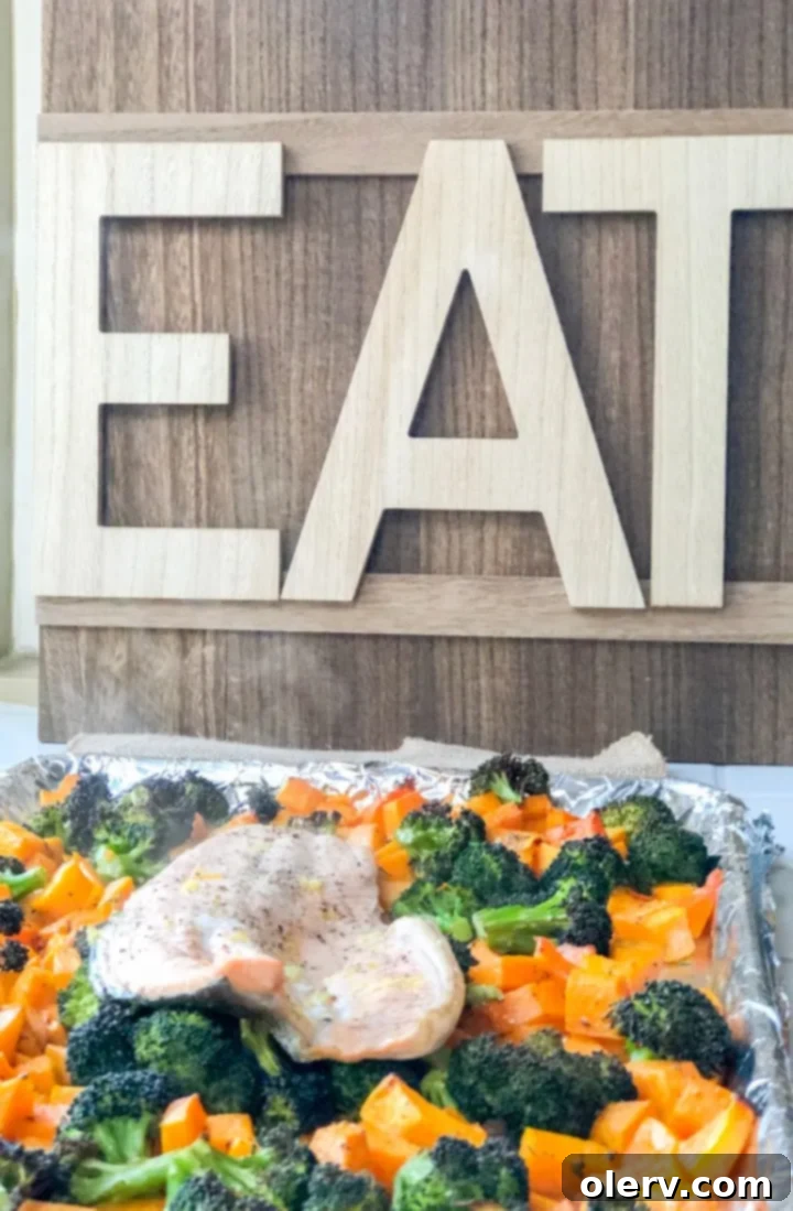 Savory Baked Salmon, Roasted Butternut Squash, and Broccoli 7 A full sheet pan dinner with baked salmon, roasted butternut squash, and broccoli, ready to serve.