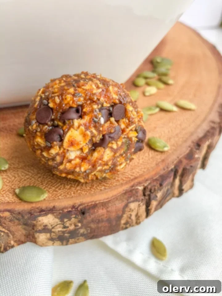 Another enticing photo of Pumpkin Energy Bites on a plate, perfectly stacked and ready for a snack