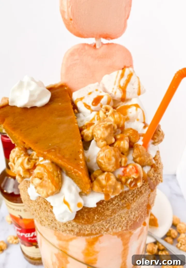 Decadent Caramel Pumpkin Pie Shake 5 Close-up of a decadent Caramel Pumpkin Pie Shake with pumpkin marshmallows