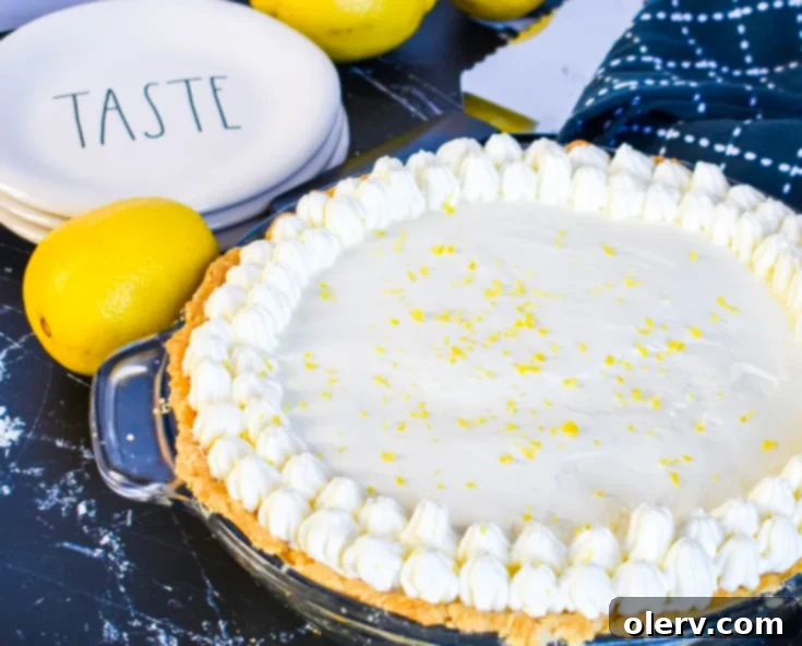 Velvety Tangy Lemon Pie 7 Finished Sour Cream Lemon Pie with whipped topping, ready to serve