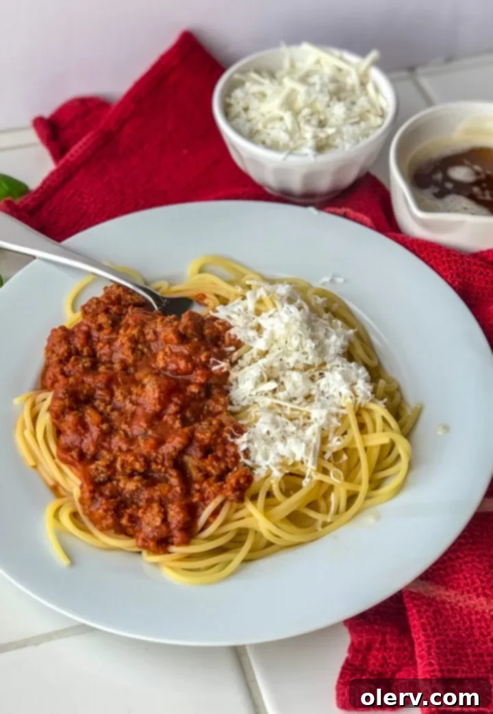 Old Spaghetti Factory's Manager's Selection 2 Old Spaghetti Factory Manager's Special on a plate, showing both meat sauce and browned butter with Mizithra cheese
