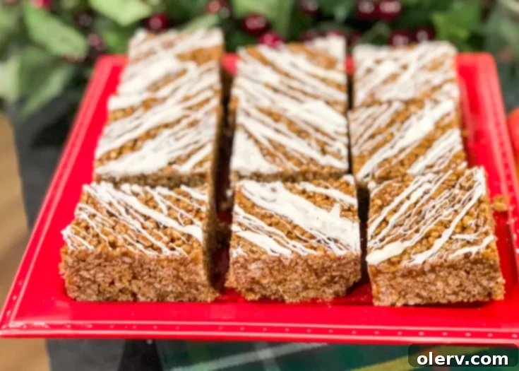 Finished Gingerbread Rice Krispie Treats with white chocolate drizzle