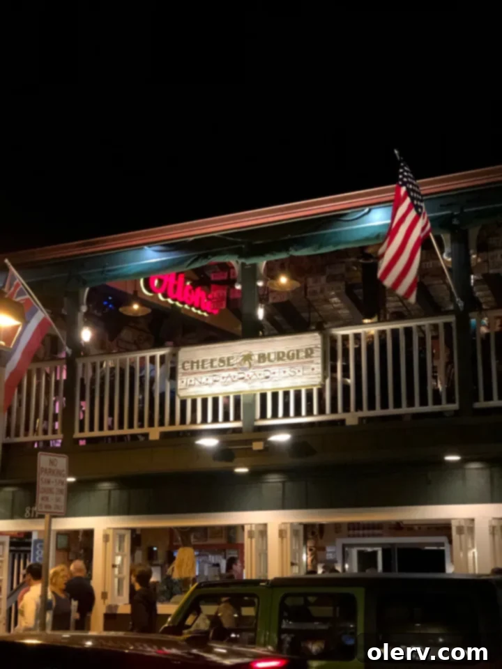 Unforgettable Maui: Your Essential Travel Companion 7 Iconic Cheeseburger in Paradise restaurant sign in Lahaina, Maui