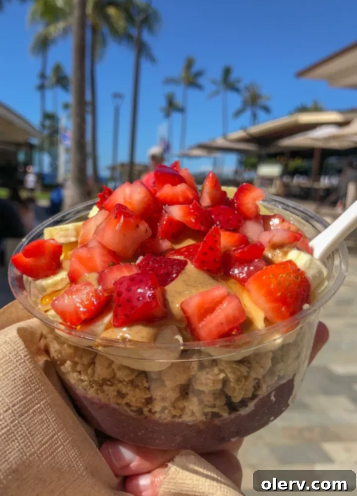 Unforgettable Maui: Your Essential Travel Companion 8 Freshly prepared Acai bowl with colorful fruits and granola, a healthy breakfast or snack option in Maui