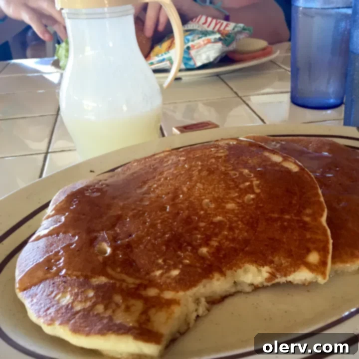 Unforgettable Maui: Your Essential Travel Companion 9 Pancakes topped with macadamia nuts and bananas at The Gazebo, a popular Maui breakfast spot
