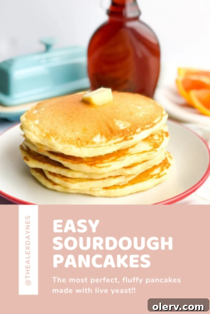 Effortless Overnight Sourdough Pancakes 6 Beautifully styled stack of sourdough pancakes with fresh berries and maple syrup, ready to be pinned