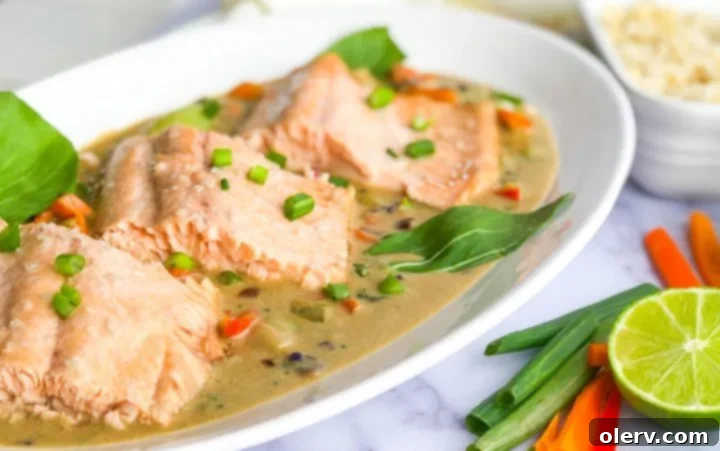 Coconut Green Curry Salmon 2 Delicious Coconut Green Curry Salmon served in a bowl with fresh herbs.