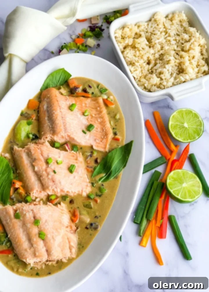 Coconut Green Curry Salmon 3 Close-up of Coconut Green Curry Salmon with sauce and vegetables.