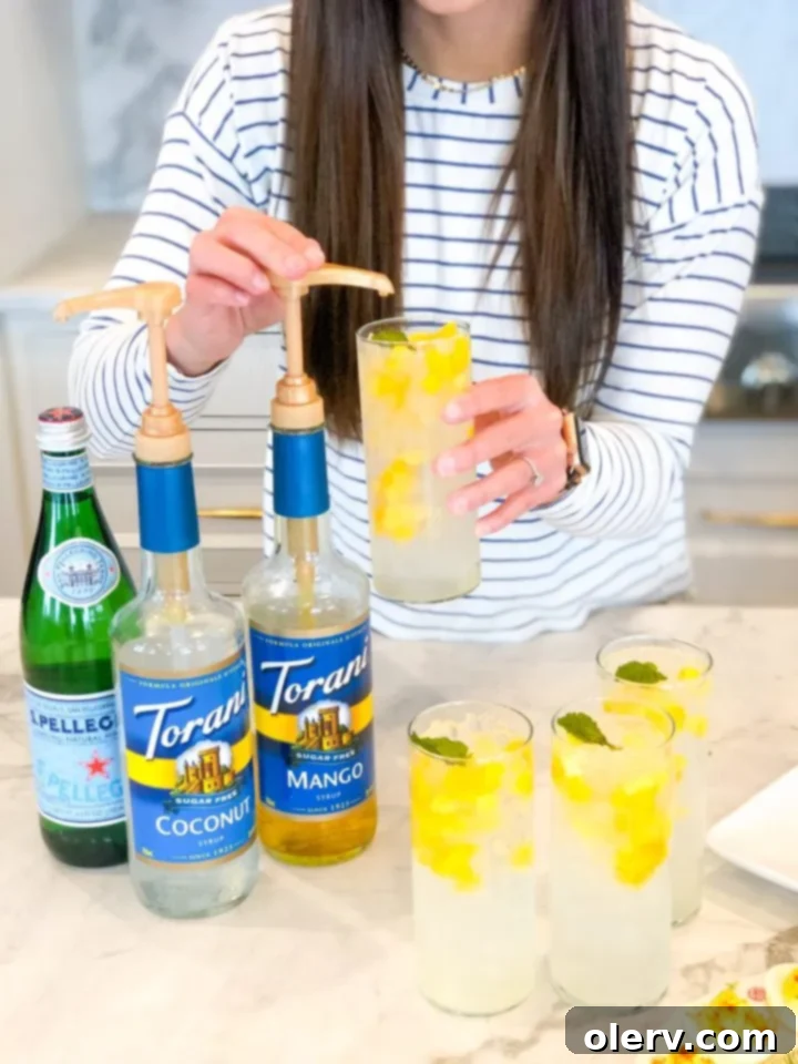 Virgin Tropical Mango Mojito 6 Preparing the mocktail by muddling mint and lime, a key step for flavor.