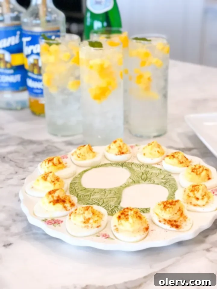 Instant Pot's Secret to Perfect Deviled Eggs 7 A beautifully set Easter table with a variety of dishes, including a prominent platter of deviled eggs, enhancing the festive atmosphere.