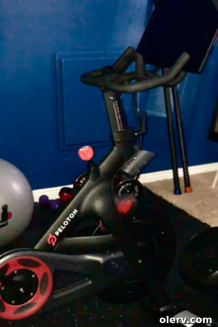 My Peloton Bike: My Go-To for Peak Fitness 8 Woman enjoying a Peloton workout
