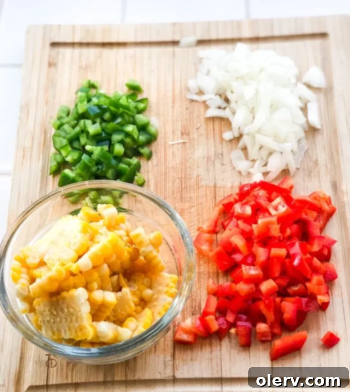 Spicy Jalapeño Corn 4 A bowl of freshly made Jalapeño Fried Corn, garnished with herbs