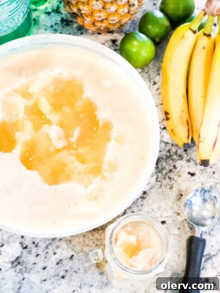 Frozen Banana Delight 8 Scoops of Frozen Banana Slush in a cup, ready for lemon-lime soda.