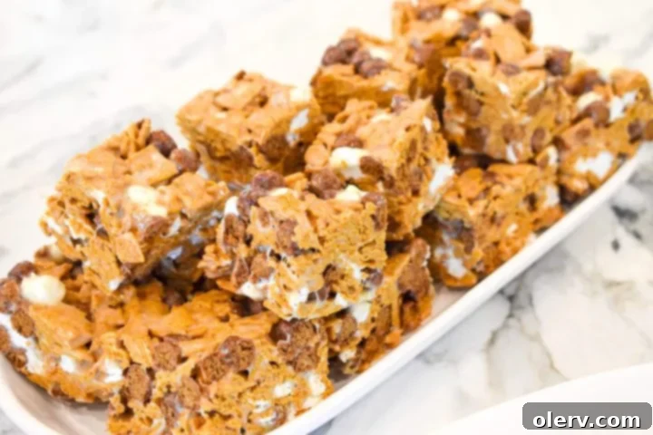 3 Deliciously Easy Memorial Day Weekend Dishes 7 Ingredients for S'more Cereal Bars, including Honey Maid S'more cereal and marshmallows.