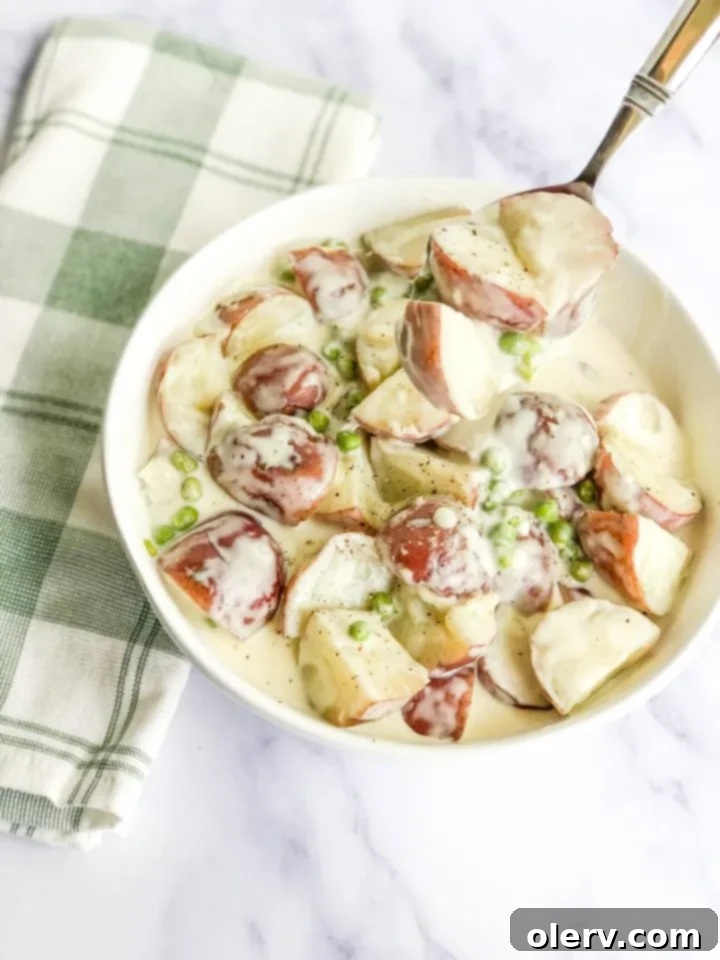 Velvet Red Potatoes and Sweet Peas 2 Creamed Red Potatoes and Peas in a serving bowl