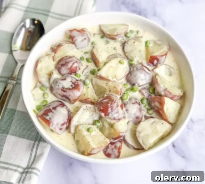 Velvet Red Potatoes and Sweet Peas 3 Close-up of Creamed Red Potatoes and Peas in a bowl