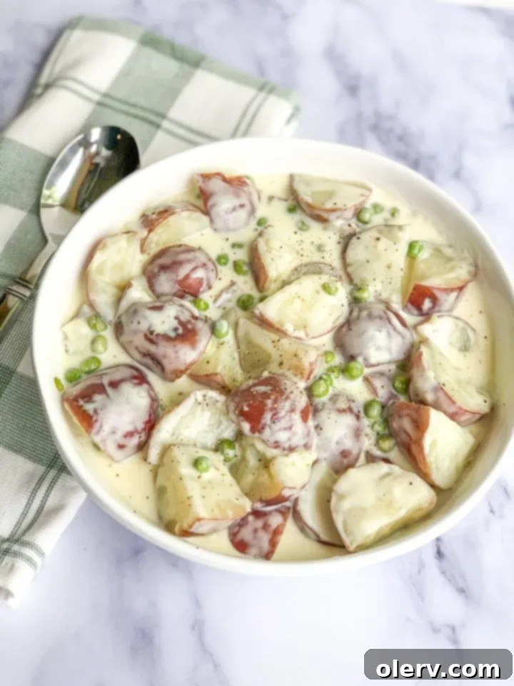 Velvet Red Potatoes and Sweet Peas 5 Red potatoes and peas in an Instant Pot steamer basket