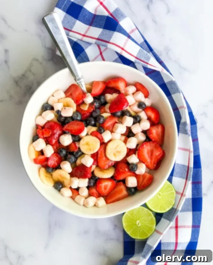 Ingredients for Red White & Blueberry Fruit Salad including fresh berries and bananas