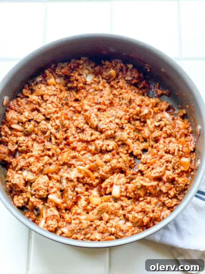 Fully Loaded Sloppy Joes 3 Close-up of the simmering Loaded Sloppy Joes mixture in a skillet, showing the rich texture