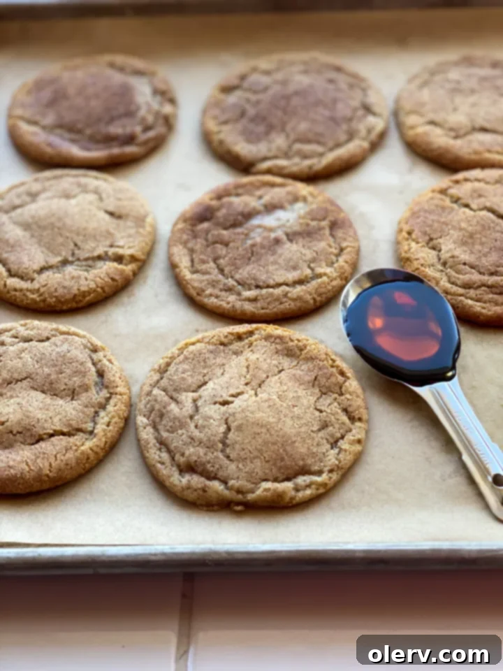 Comforting Maple Snickerdoodles 7 A stack of Maple Snickerdoodles on a white plate, ready to be served.