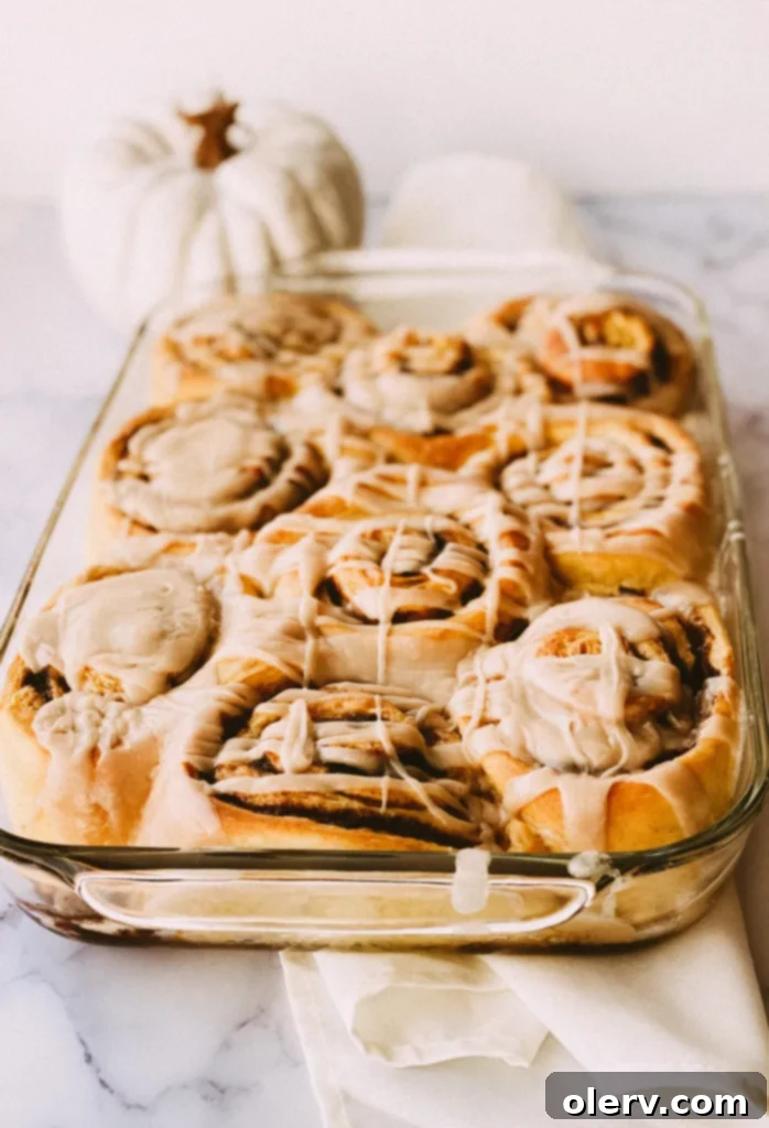 Spiced Pumpkin Cinnamon Rolls with Brown Butter Glaze 3 Close-up of baked pumpkin cinnamon rolls