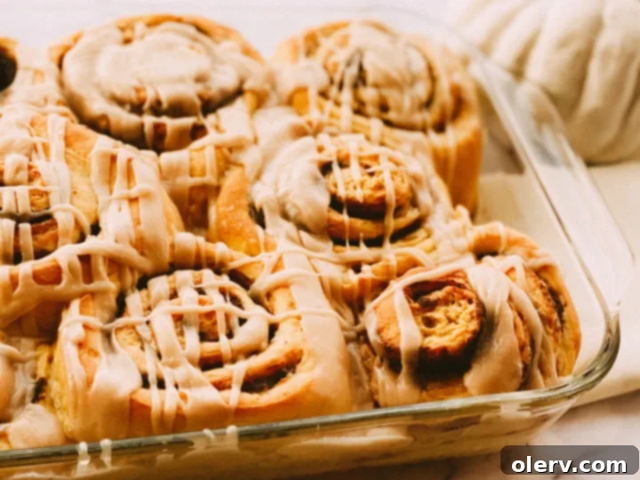 Spiced Pumpkin Cinnamon Rolls with Brown Butter Glaze 5 Rolled pumpkin cinnamon roll dough with filling